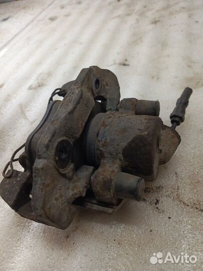 Суппорт тормозной передний левый Ford Fusion