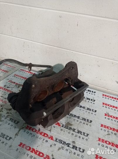 Суппорт тормозной передний левый Honda Pilot YF4