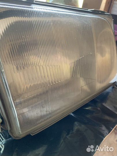 Фара правая Hella w124