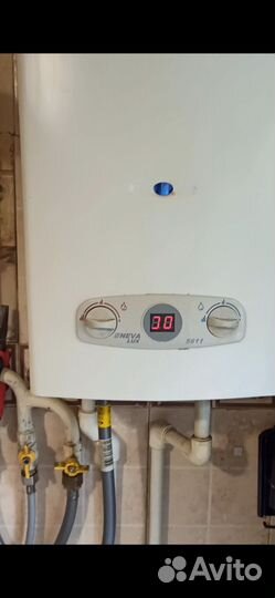 Газовый проточный водонагреватель колонка