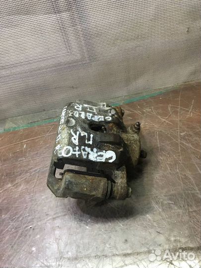 Суппорт передний правый Kia Cerato 3