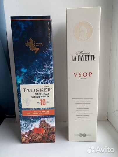 Коробки и бутылки из-под виски