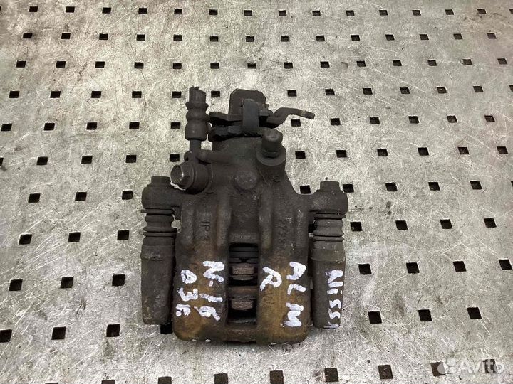 Суппорт задний правый Nissan Almera