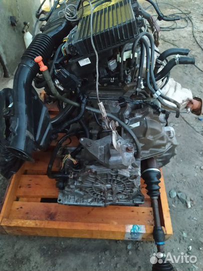 Двигатель с коробкой на мазду демио