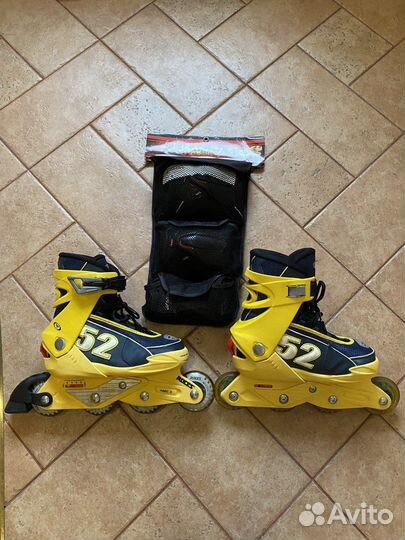 Роликовые коньки