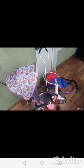 Трехколесный велосипед и санки