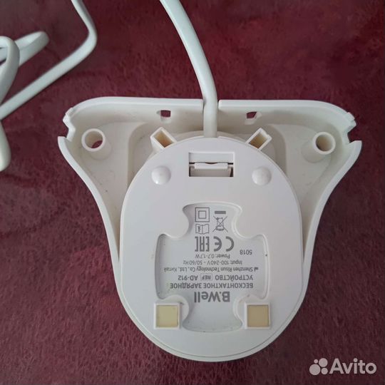 Бесконтактное зарядное устройство для ирригатора