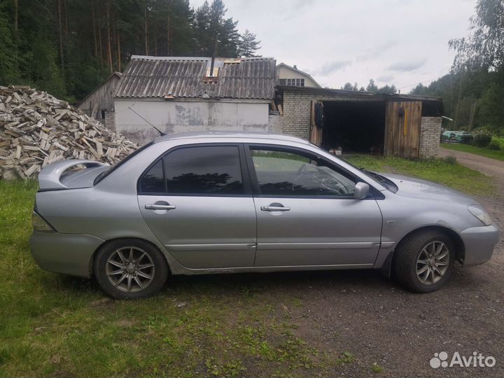 Mitsubishi Lancer 1.6 МТ, 2006, битый, 210 844 км