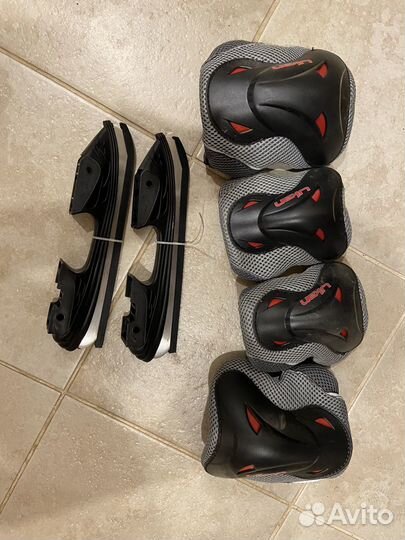 Роликовые коньки