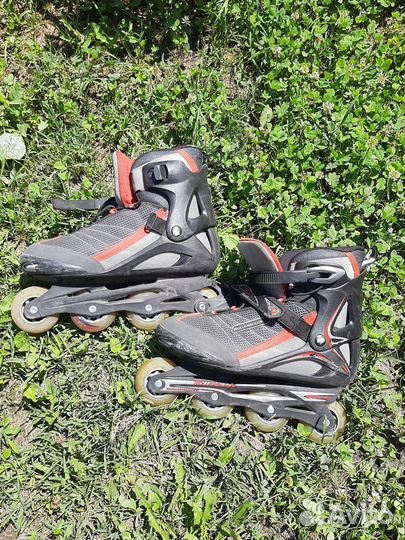 Роликовые коньки