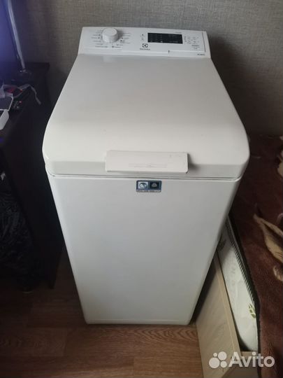 Стиральная машина с вертикальной загрузкой