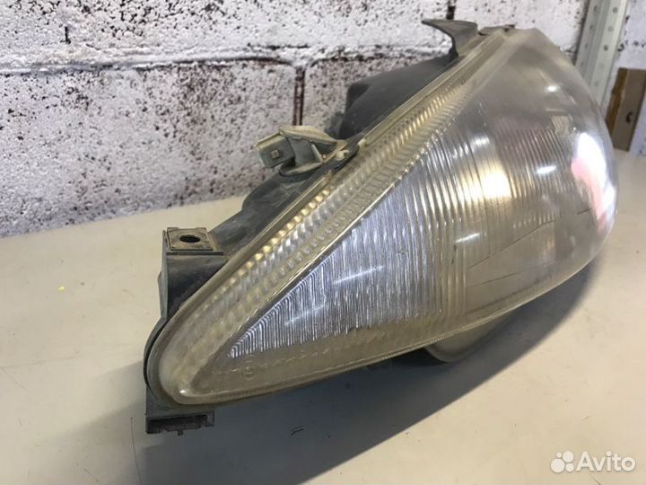 Фара передняя левая Peugeot 206 хетчбек 1.9D 1998