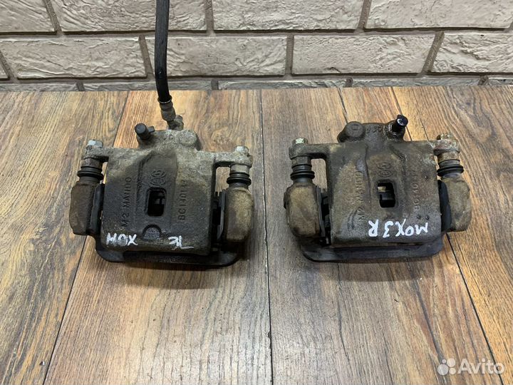 Kia Mohave Суппорт тормозной задний LH RH