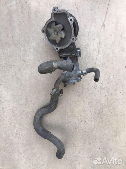 Nissan Almera N15 GA14DE помпа, термостат