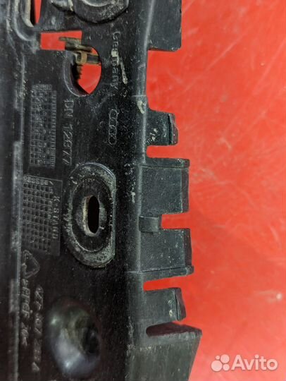 Кронштейн переднего бампера левый Audi A6 Allroad