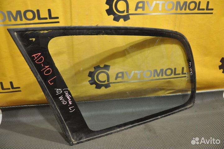 Стекло багажника левое nissan AD VY10