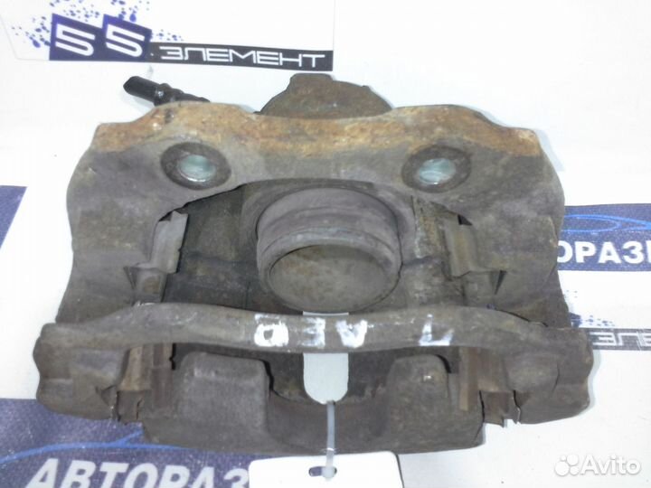 Суппорт тормозной передний Peugeot 207