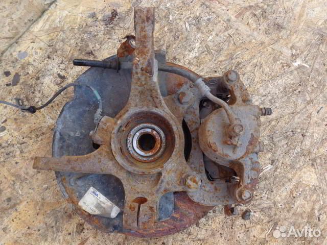 Суппорт передний левый Kia Sportage 3 SL