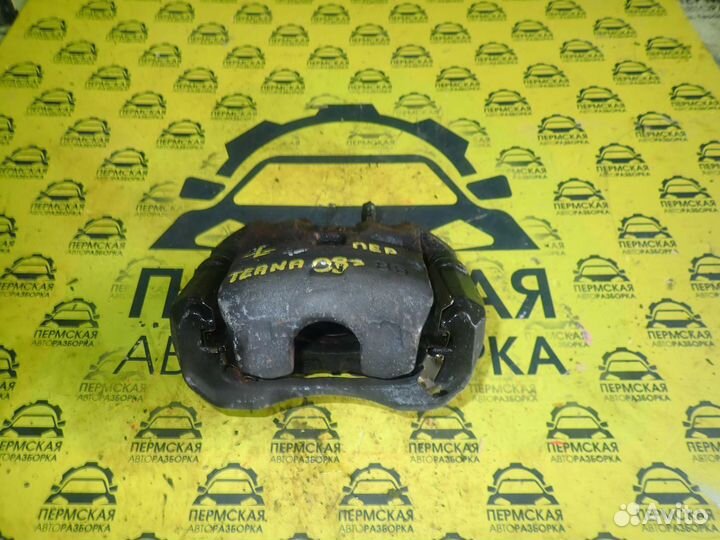 Суппорт передний левый Nissan Teana J32