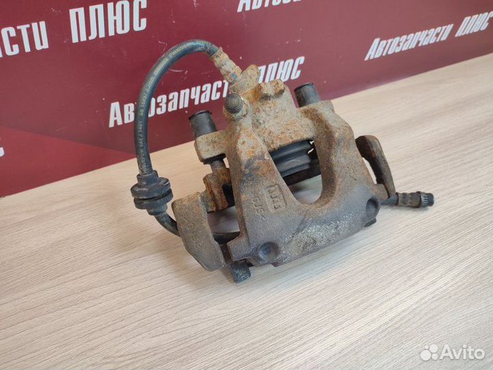 Суппорт тормозной передний правый Renault Logan