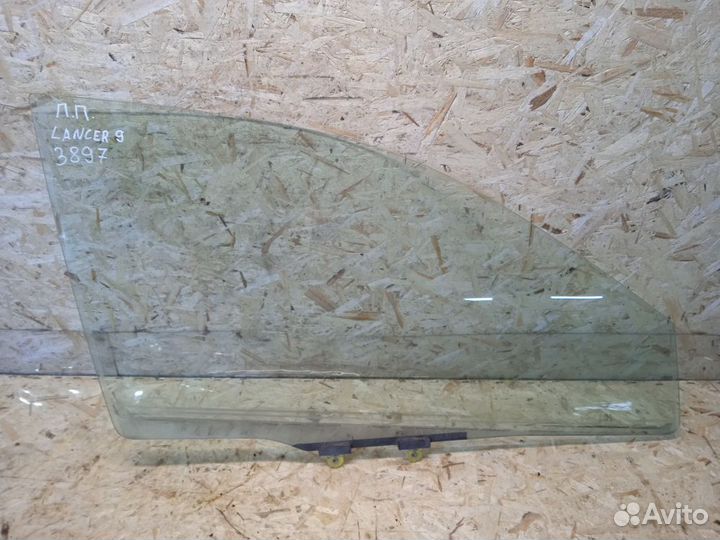 Стекло двери передней правой Mitsubishi Lancer