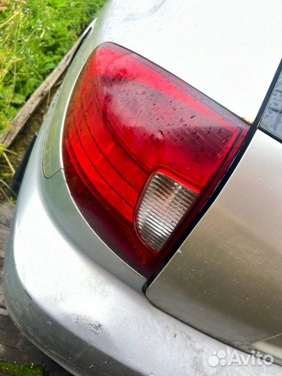 Фонарь задний левый Kia Rio рест. DC 2003