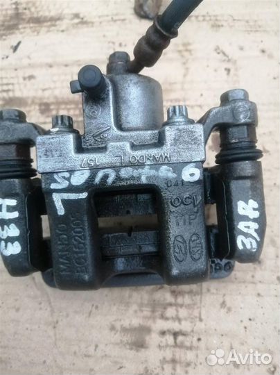 Суппорт тормозной задний левый Hyundai Sonata 6 Y