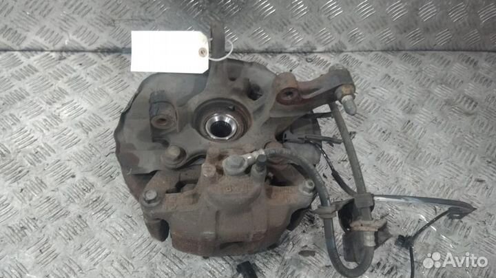 Кулак поворотный левый Mitsubishi Lancer 10 (07-10)