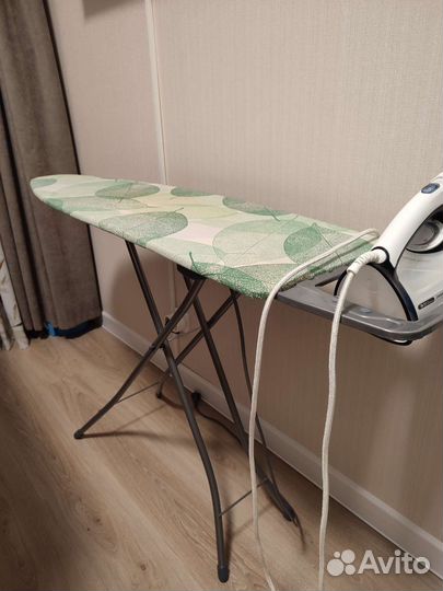 Гладильная доска с розеткой