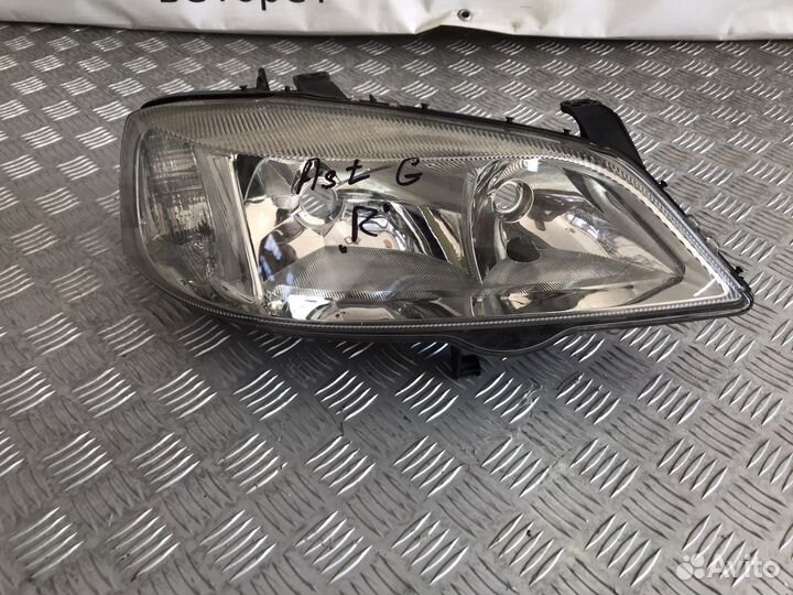 Фара Opel Astra G