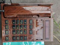 Старый многофункциональный телефонный аппарат