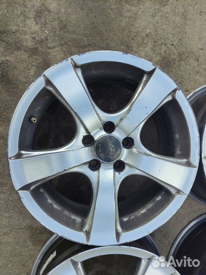 Диски Subaru R16