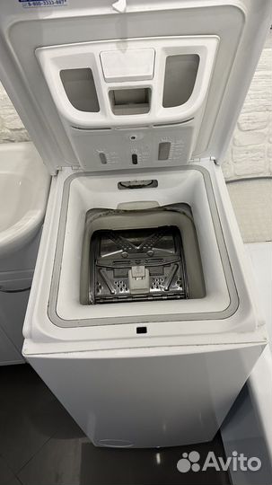 Стиральная машина с вертикальной загрузкой Indesit