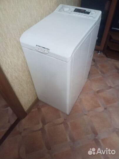 Стиральная машина с вертикальной загрузкой