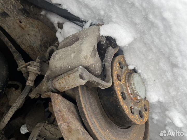 Суппорт задний левый правый Skoda Octavia A5