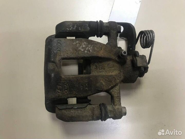 Суппорт задний левый Kia Rio