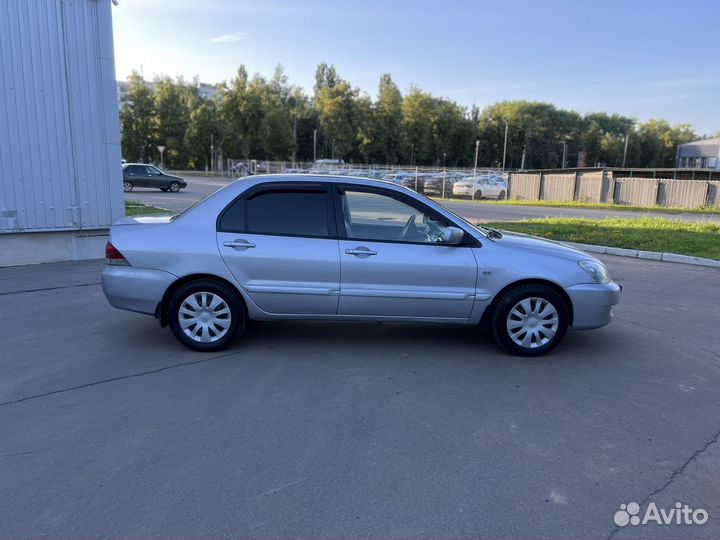 Mitsubishi Lancer 1.6 МТ, 2009, 237 400 км