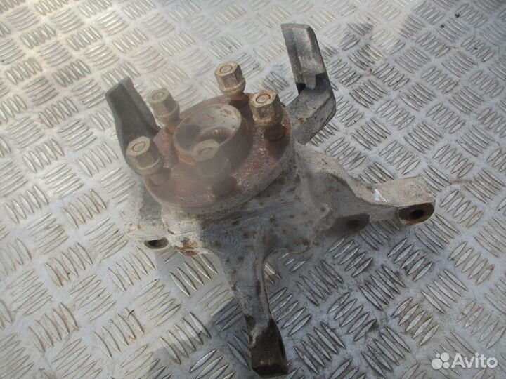 Кулак поворотный передний Dodge Caravan 3