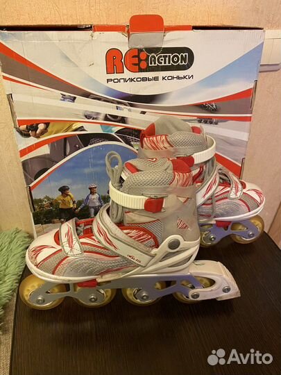 Роликовые коньки