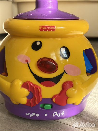 Сортер-музыкальная игрушка FisherPrice горшочек