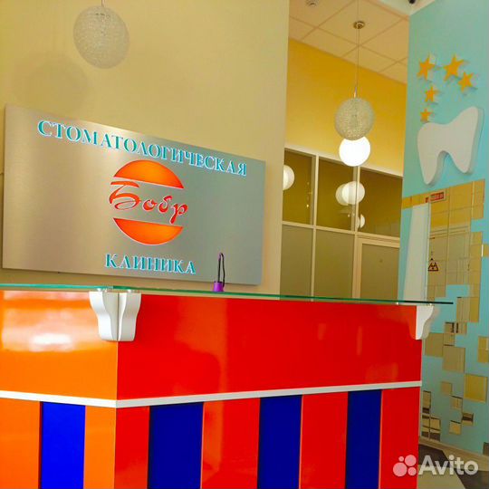 Врач стоматолог