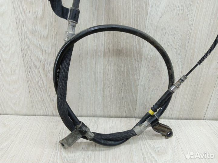Трос стояночного тормоза левый Hyundai Solaris 2