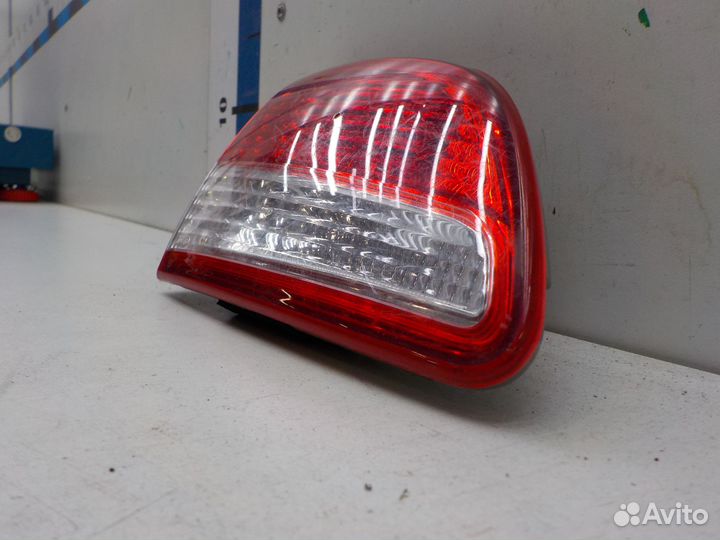 Фонарь задний левый внутренний Nissan Almera 2012
