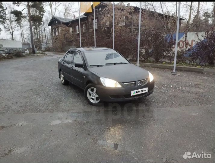 Mitsubishi Lancer 1.6 МТ, 2004, битый, 450 000 км