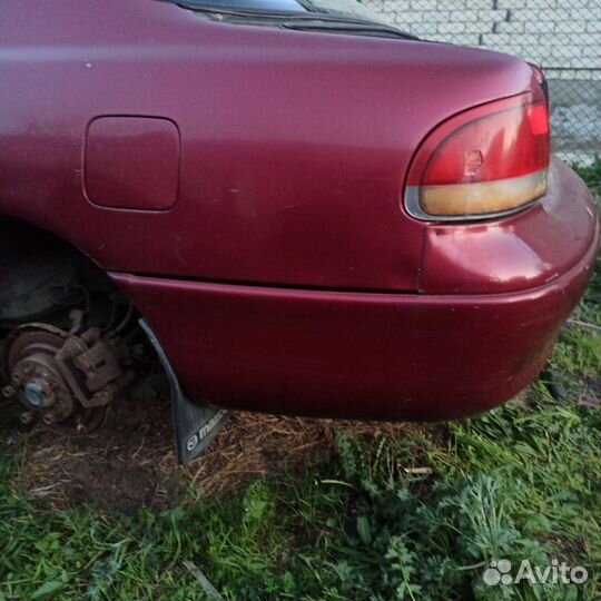 Бампер задний Mazda 626 GE