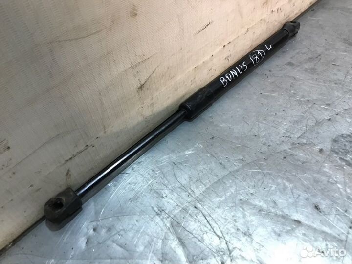 Амортизатор багажника задний Chery Bonus A13