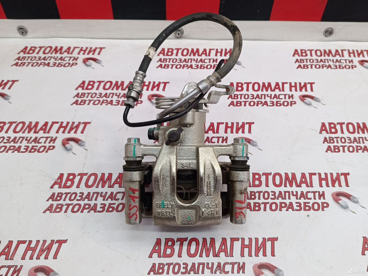 Супорт тормозной задний левый Geely Emgrand SS11