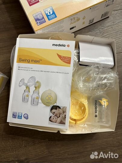 Молокоотсос medela swing maxi flex