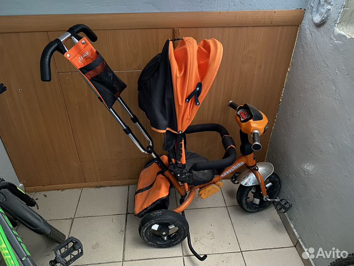 Детский велосипед с родительской ручкой