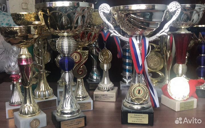 Тренер по большому теннису